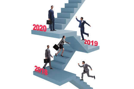 Businessman climbing stairs on yearly basis