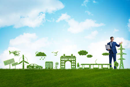 Businessman in green and the environmental concept