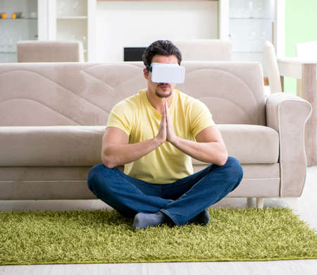 The young man with virtual reality goggles