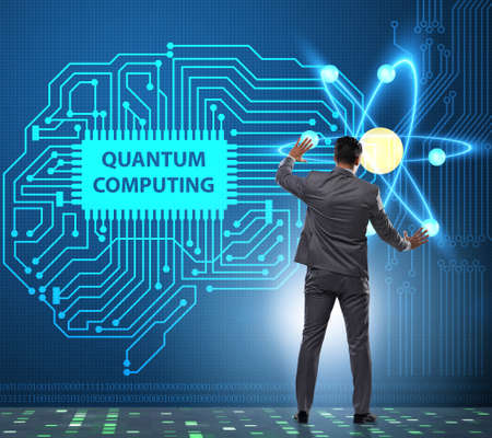 Businessman pressing virtual button in quantum computing conceptの写真素材