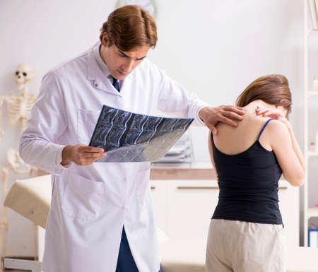 Male radiologist detecting cause of the illnessの写真素材