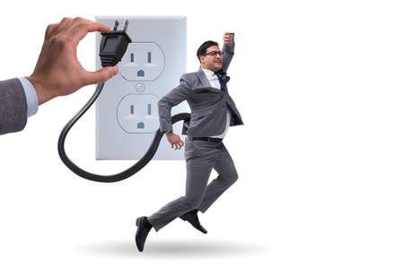 Businessman losing energy to workの写真素材