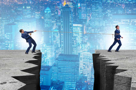 Boss holding his employee in retention conceptの写真素材