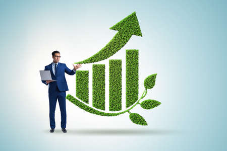 Green economy growth concept with businessmanの写真素材