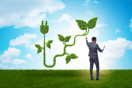 Green energy concept with businessmanの写真素材