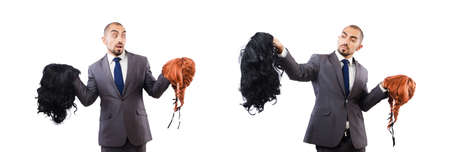 Funny businessman with female wig isolated on whiteの写真素材