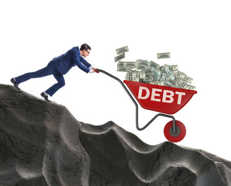 Businessman pushing wheelbarrow with dollars downhillの写真素材