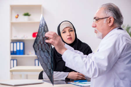 Arab woman visiting experienced doctorの写真素材