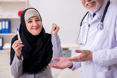 Arab woman visiting experienced doctorの写真素材