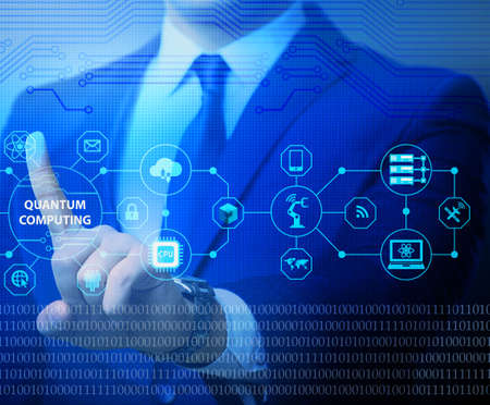 Businessman pressing virtual button in quantum computing concept