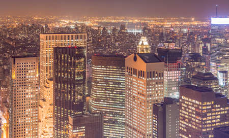 The night view of new york manhattan during sunsetの写真素材