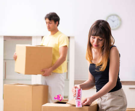 Young pair moving to new flat with fragile things