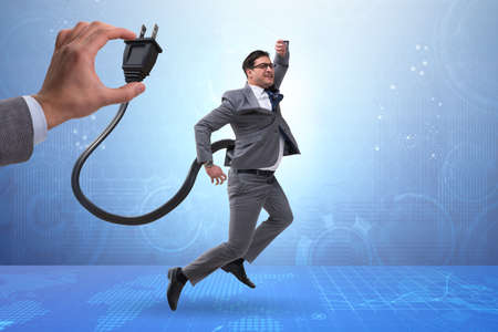 Businessman losing energy to work