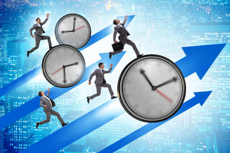 Growth and recovery concept with businessman and clocksの写真素材
