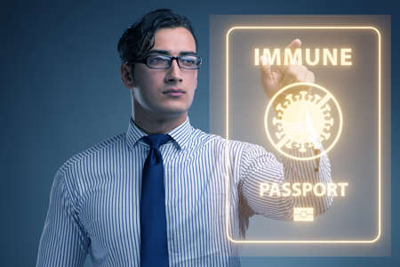 Concept of immunity passport - pressing virtual buttonの写真素材