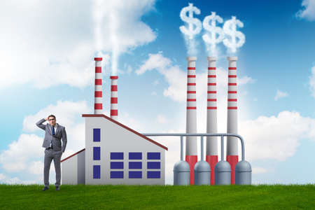 Businessman in the carbon tax conceptの写真素材