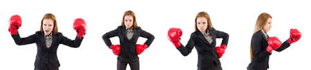 Woman businesswoman with boxing gloves on whiteの写真素材