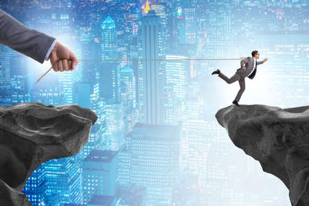 Boss holding his employee in retention conceptの写真素材