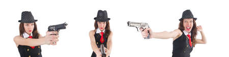 Young woman gangster with gun on whiteの写真素材