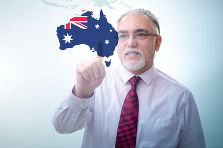 Concept of immigration to Australia with virtual button pressingの写真素材