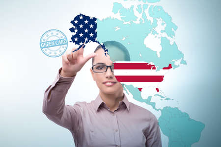 Concept of immigration to USA with virtual button pressingの写真素材