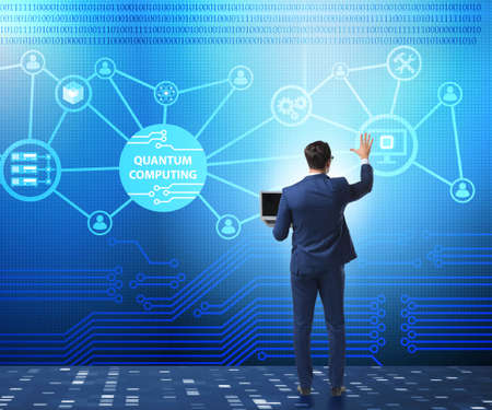 The businessman pressing virtual button in quantum computing concept