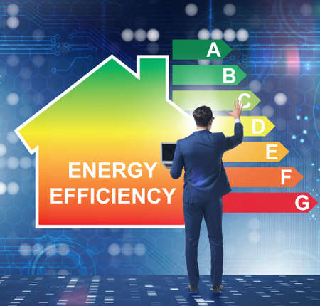 The businessman in energy efficiency conceptの写真素材