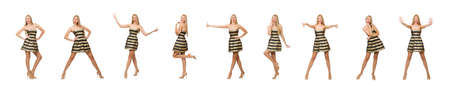 Beautiful girl in gold and black dress isolated on whiteの写真素材