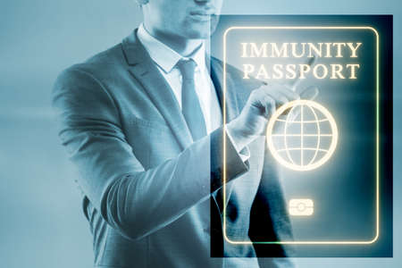 Concept of immunity passport - pressing virtual buttonの写真素材