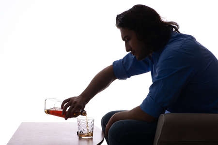 Young man suffering from alcoholism