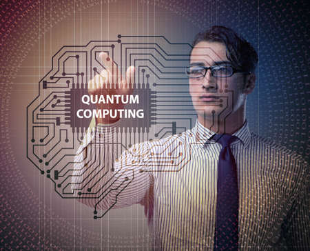 Businessman pressing virtual button in quantum computing conceptの写真素材