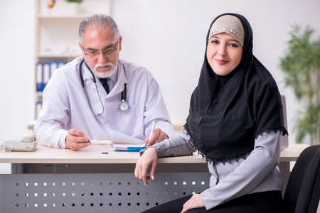 Arab woman visiting experienced doctorの写真素材