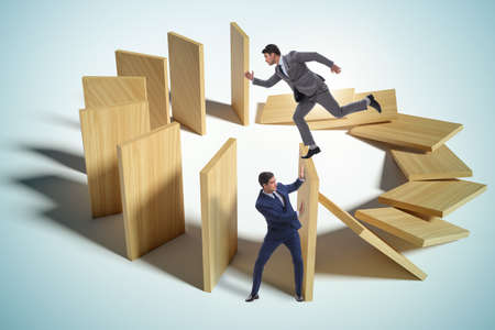 Domino effect and competition conceptの写真素材