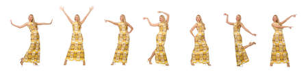 Pretty girl in yellow floral dress isolated on whiteの写真素材