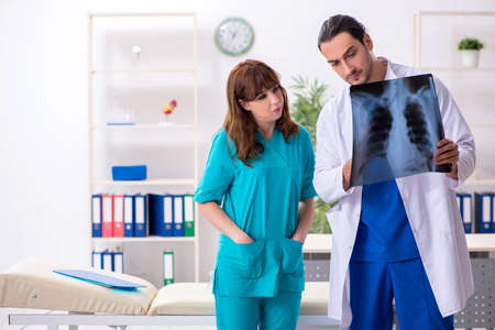 Two doctors colleagues working in the hospital