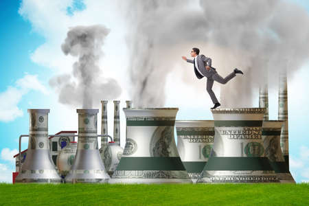 Businessman in carbon tax conceptの写真素材