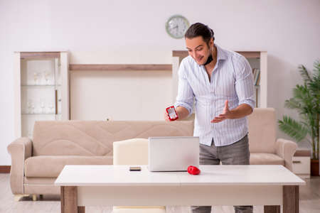 Young man in love during pandemic diseaseの写真素材