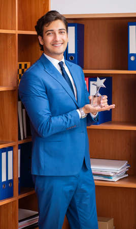Young employee working in the officeの写真素材
