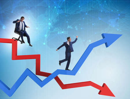Growth and decline concept with businessmenの写真素材