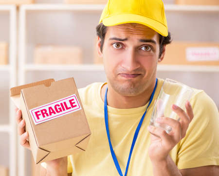 Handsome contractor working in box delivery relocation serviceの写真素材