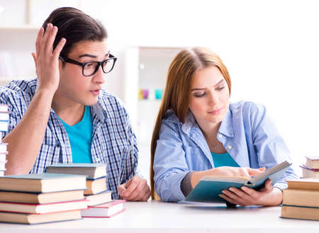 Pair of students studying for university examsの写真素材