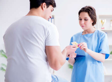 Patient visiting doctor for annual regular check-up in hospitalの写真素材