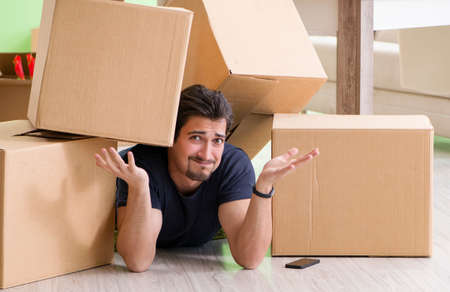 Man moving house with boxes