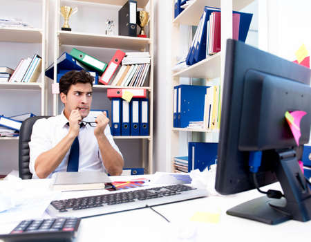 Angry and scary businessman in the officeの写真素材