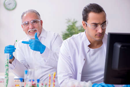 Two chemists working in the labの写真素材