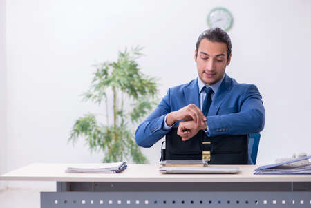Young male employee in the officeの写真素材