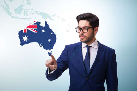 Concept of immigration to Australia with virtual button pressingの写真素材