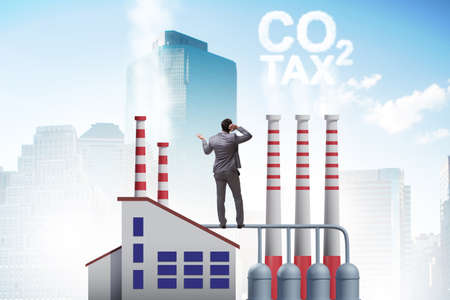 Businessman in carbon tax conceptの写真素材