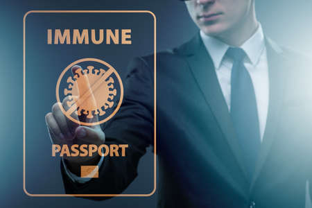 Concept of immunity passport - pressing virtual buttonの写真素材