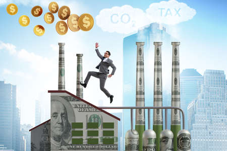 Businessman in carbon tax conceptの写真素材